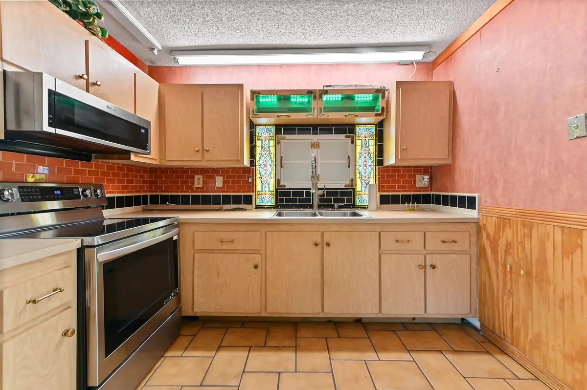 08 kitchen 01 at 703 SW 76th Avenue, North Lauderdale