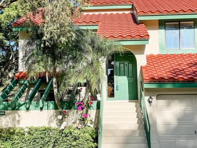 Exterior Front at 25 Lexington Lane E, Palm Beach Gardens