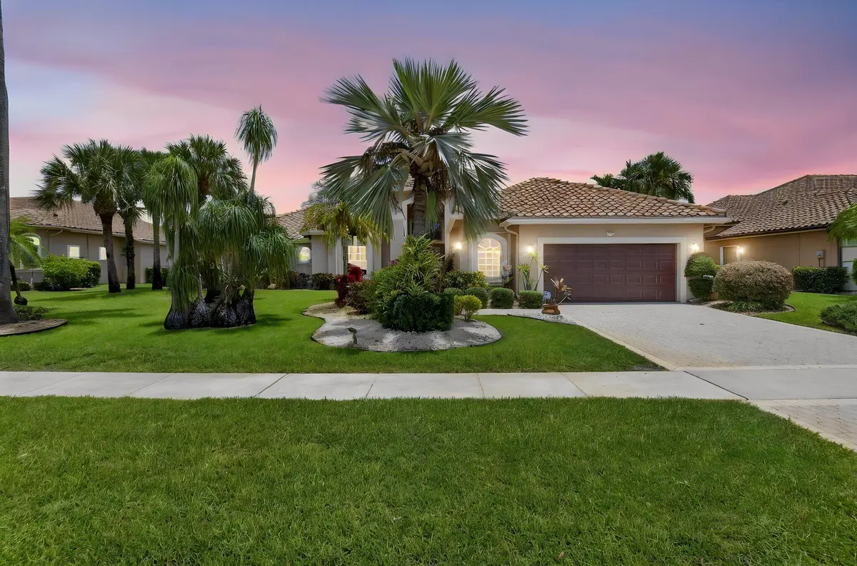 exterior front twilight at 8064 Desmond Drive, Boynton Beach