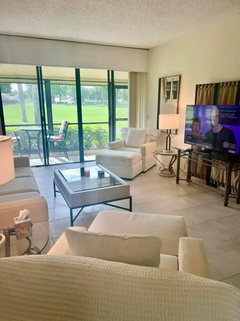 LIVING ROOM at 225 Old Meadow Way, Palm Beach Gardens