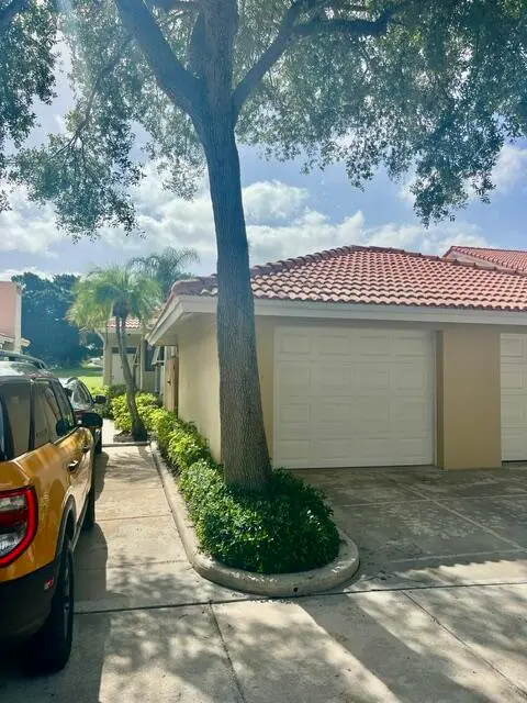 EXTERIOR FRONT at 225 Old Meadow Way, Palm Beach Gardens