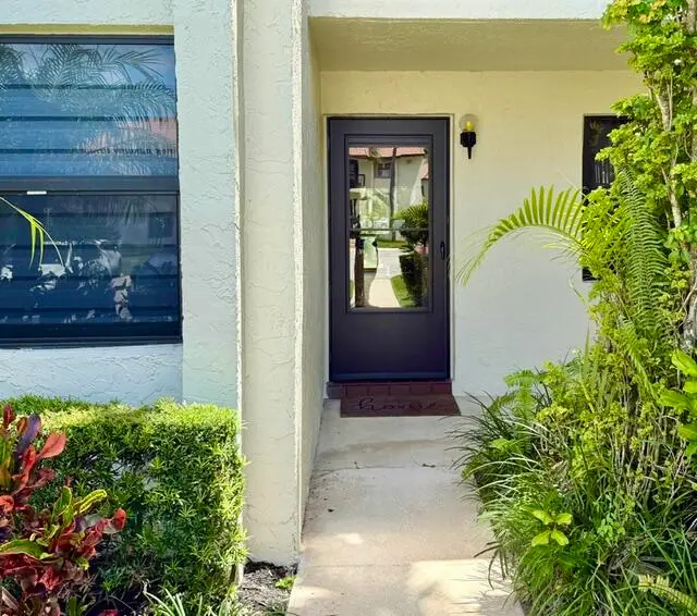 Private front door at 22148 Palms Way 101, Boca Raton