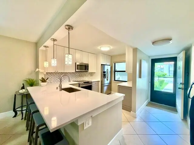 Plenty of stool space at 22148 Palms Way 101, Boca Raton