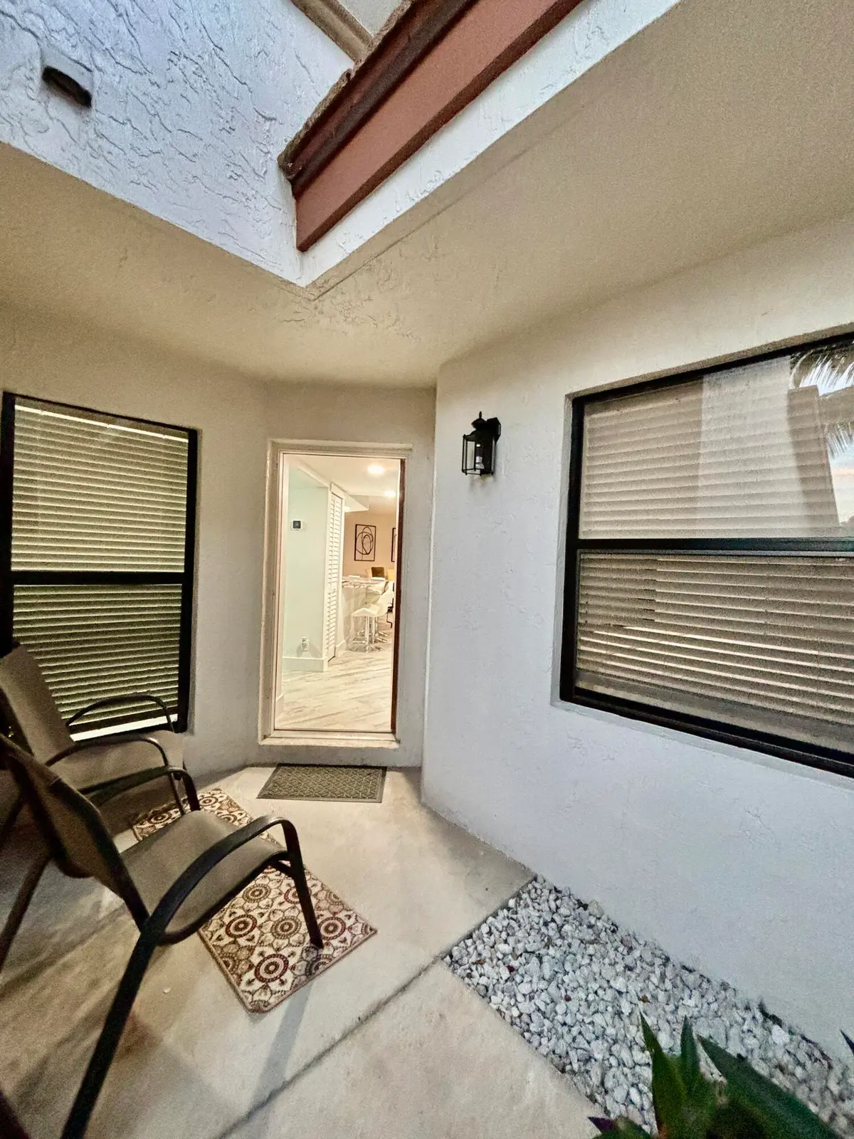 Private front patio at 12692 Shoreline Drive 3B, Wellington