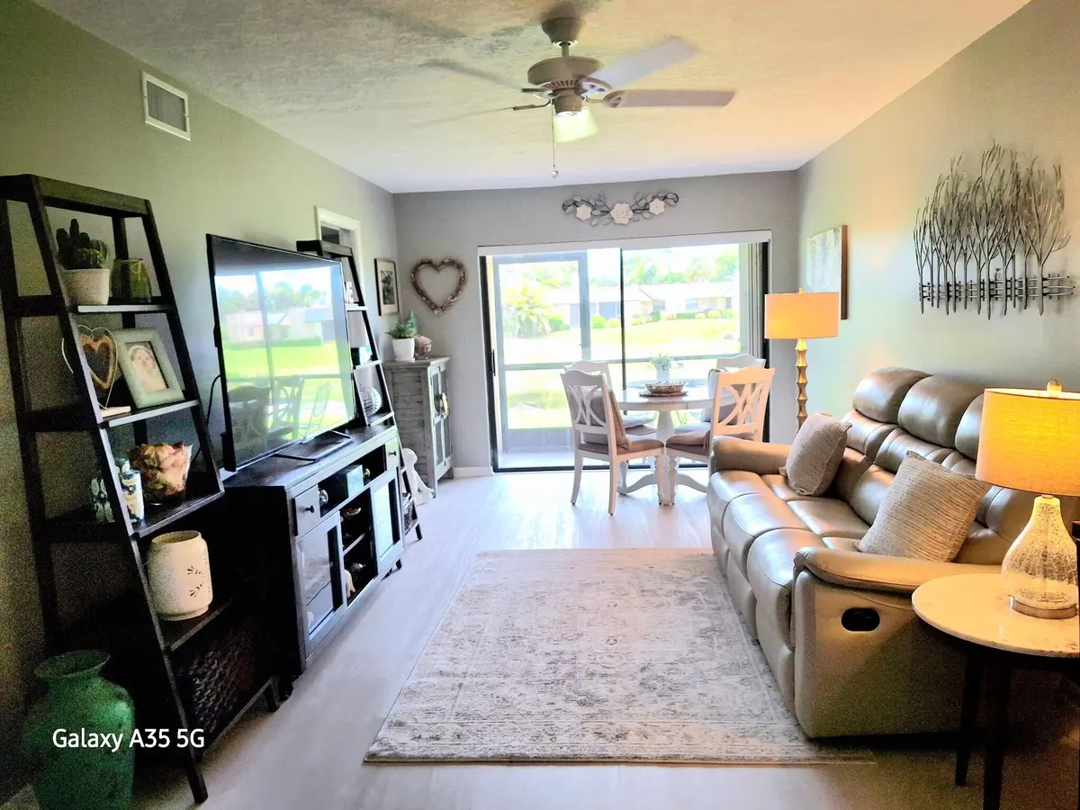 living room at 2069 NE Collins Circle 7-50, Jensen Beach