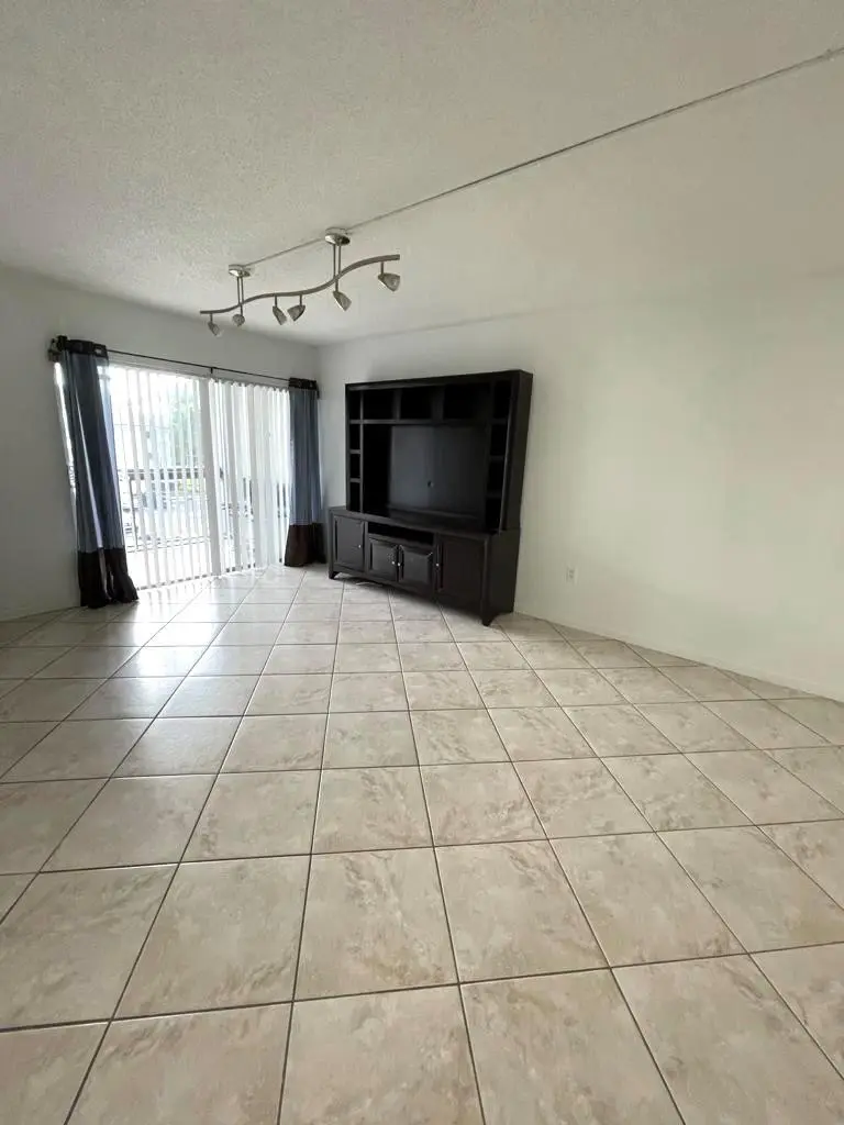 Photo 5 at 711 N PINE ISLAND Road 305, Plantation