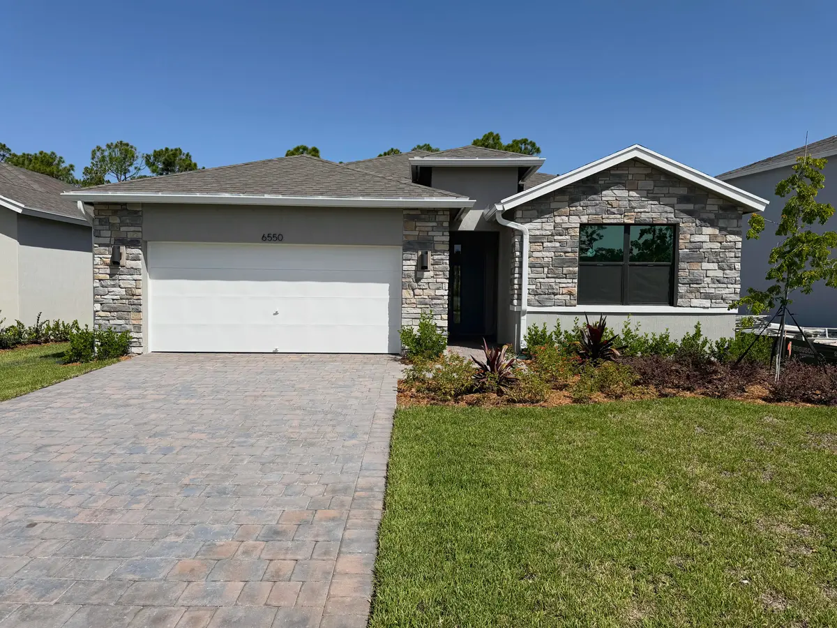 Lot 6 exterior at 6550 SE Park Trace Drive, Stuart