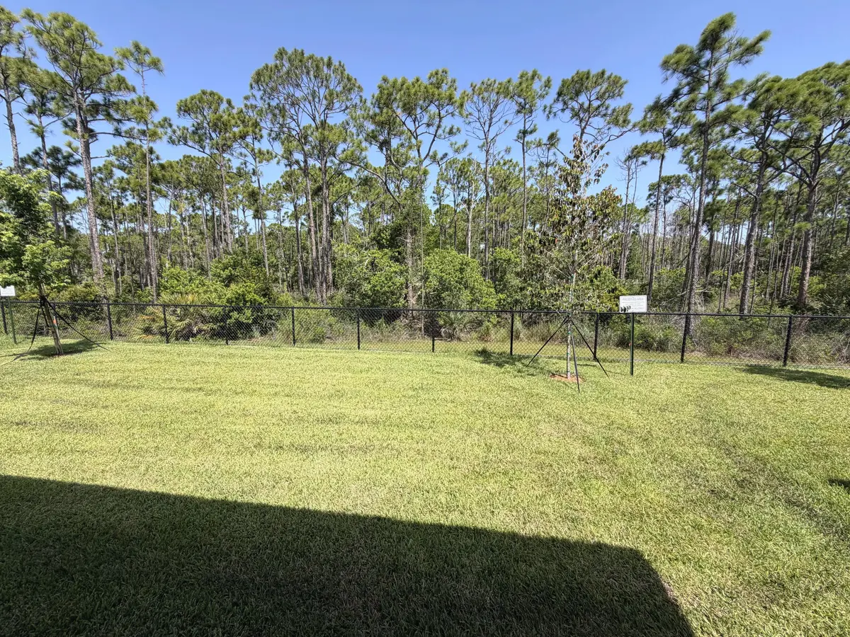 Lot 8 backyard at 6570 SE Park Trace Drive, Stuart