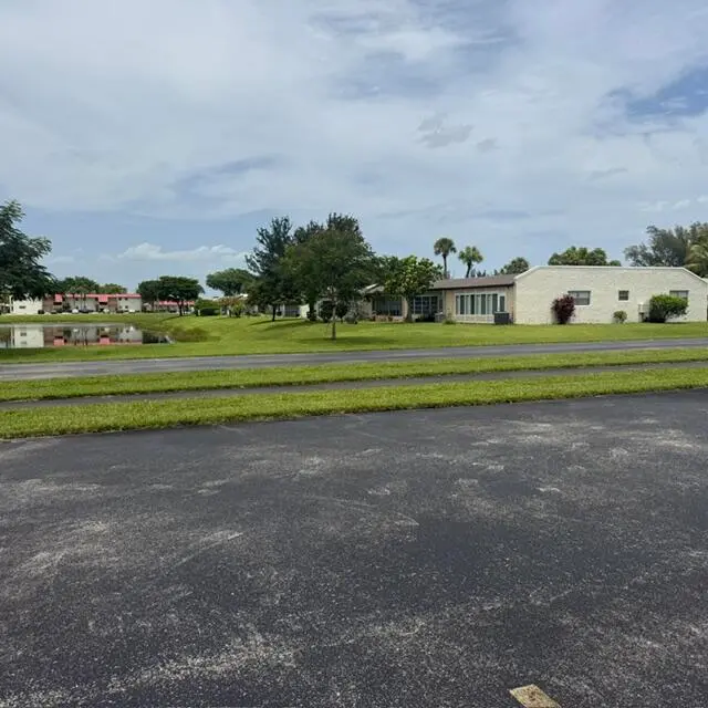 water view in front of unit at 166 Lake Meryl Drive, West Palm Beach