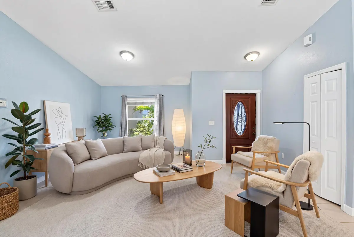 Virtually staged living room at 2674 SW ABELARD Street, Port St. Lucie