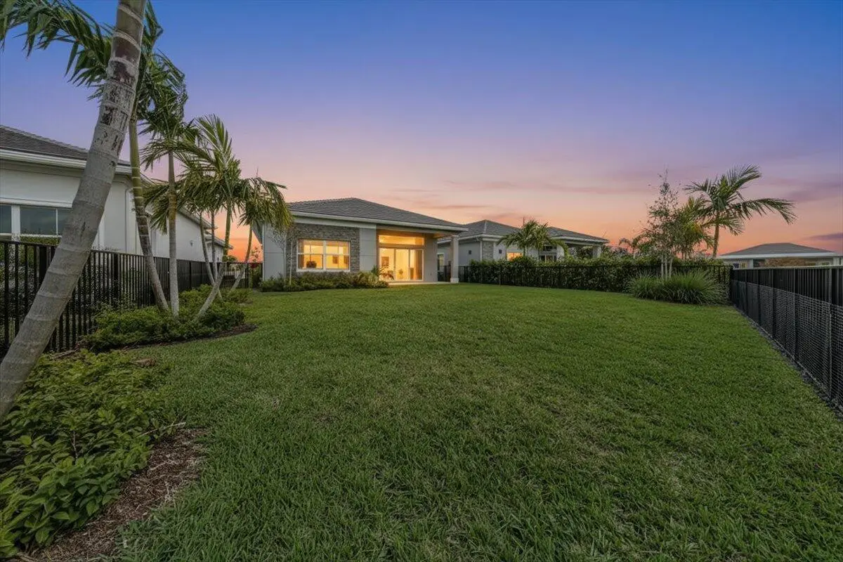 51-Back twilight at 10161 TIMBER CREEK Way, Palm Beach Gardens