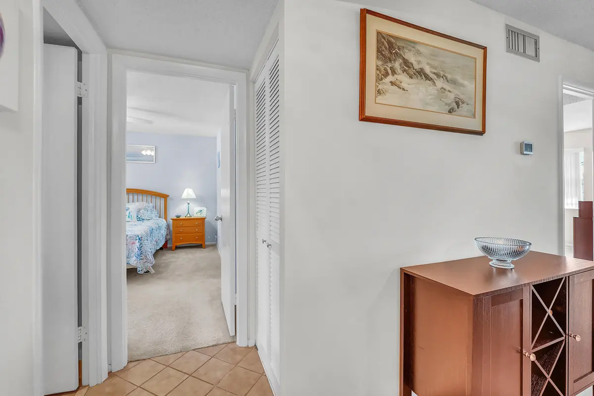 Guest room to the left of entry at 210 Lake Evelyn Drive, West Palm Beach