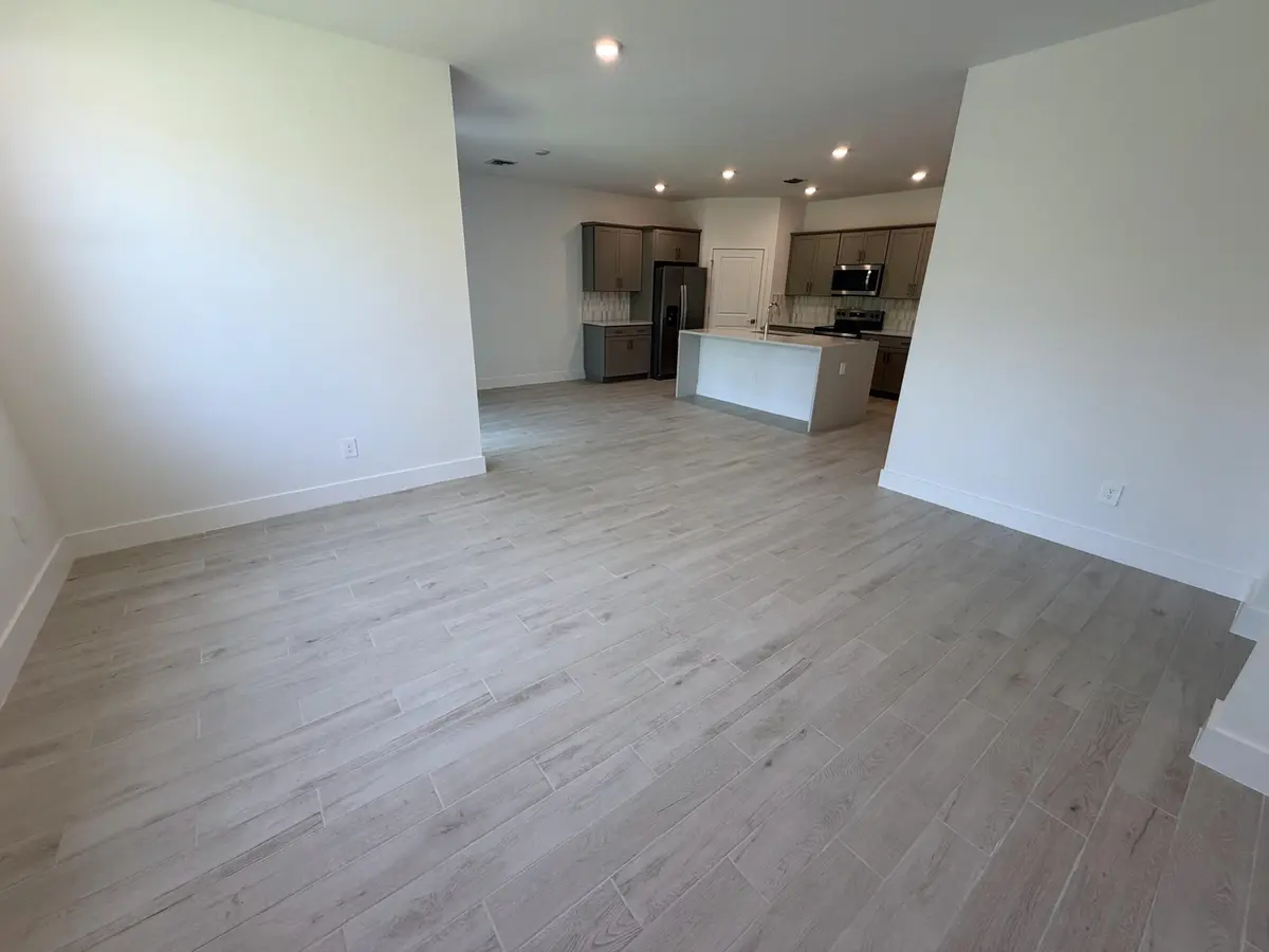 Lot 16 great room 2 at 6650 SE Park Trace Drive, Stuart