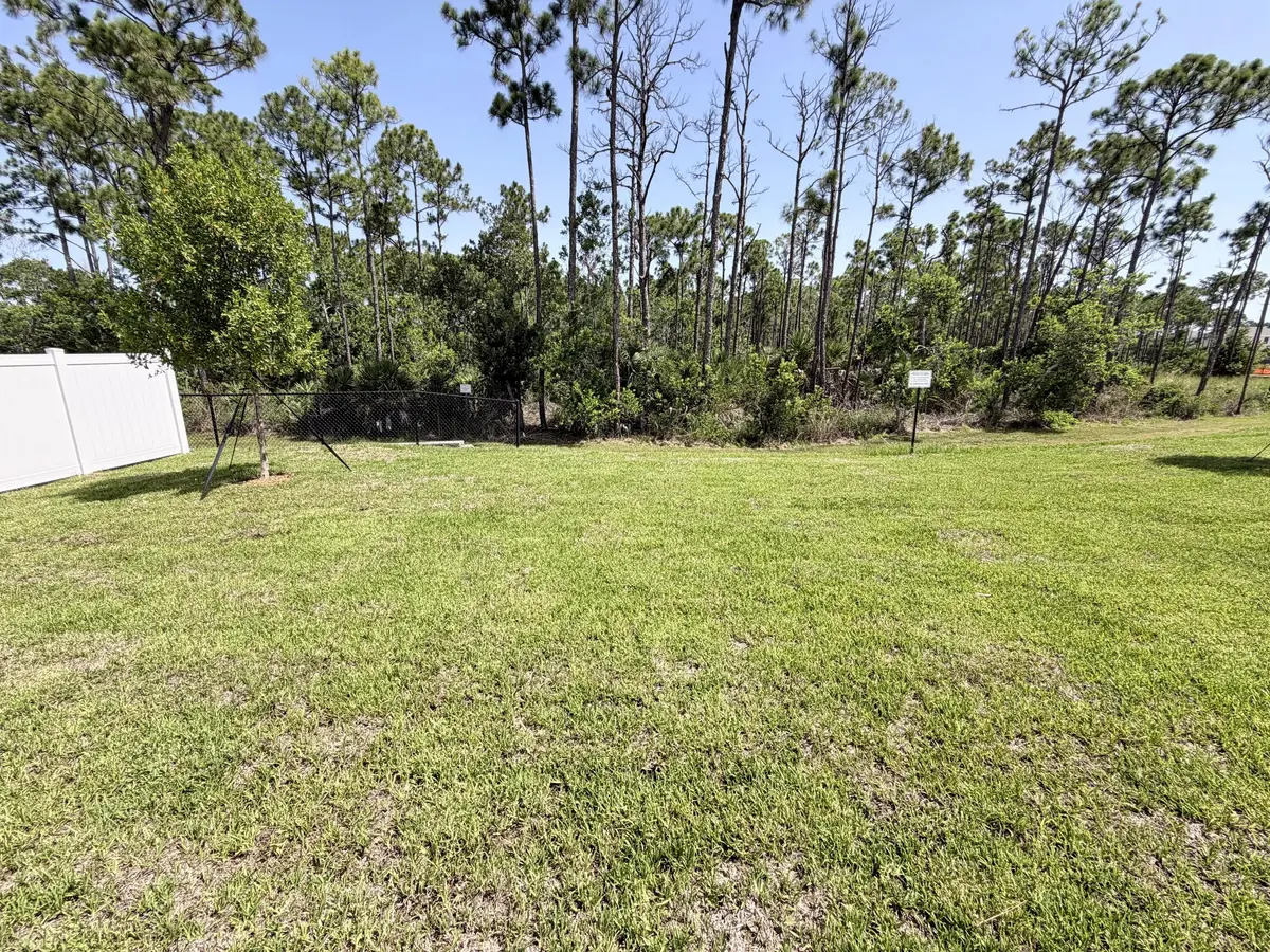 Lot 17 backyard at 6660 SE Park Trace Drive, Stuart