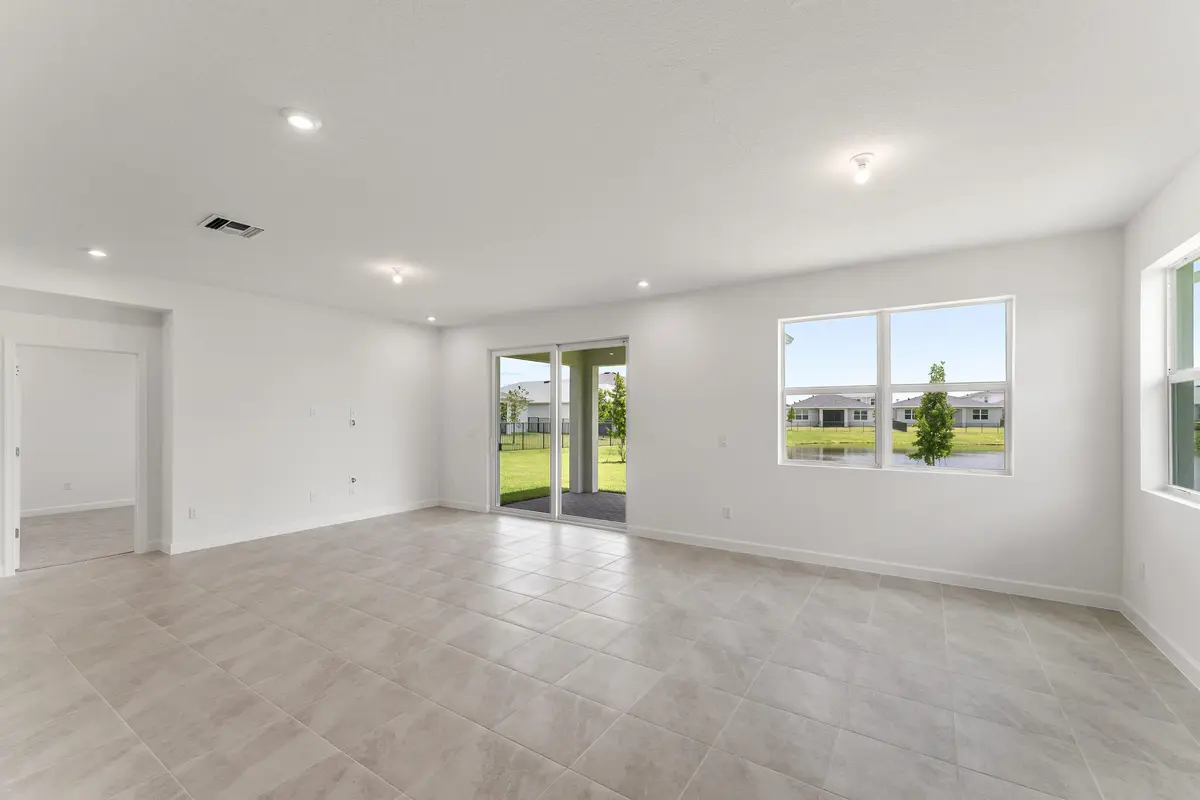 US_SEF_CALEDON_LOT 332_GREAT ROOM at 10952 SW Orana Drive, Port St. Lucie