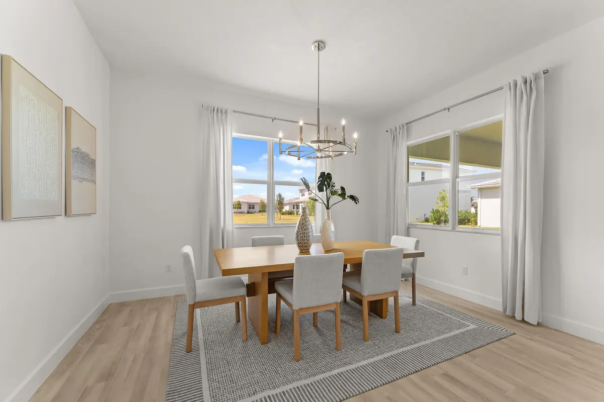 US_SEF_Omni_Lot 116 Staged_Dining at 14547 SW Sarilla Boulevard, Port St. Lucie