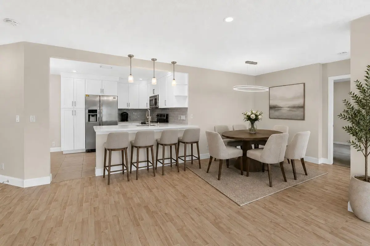 Virtually Staged Formal Dining Area at 5418 Firenze Drive C, Boynton Beach