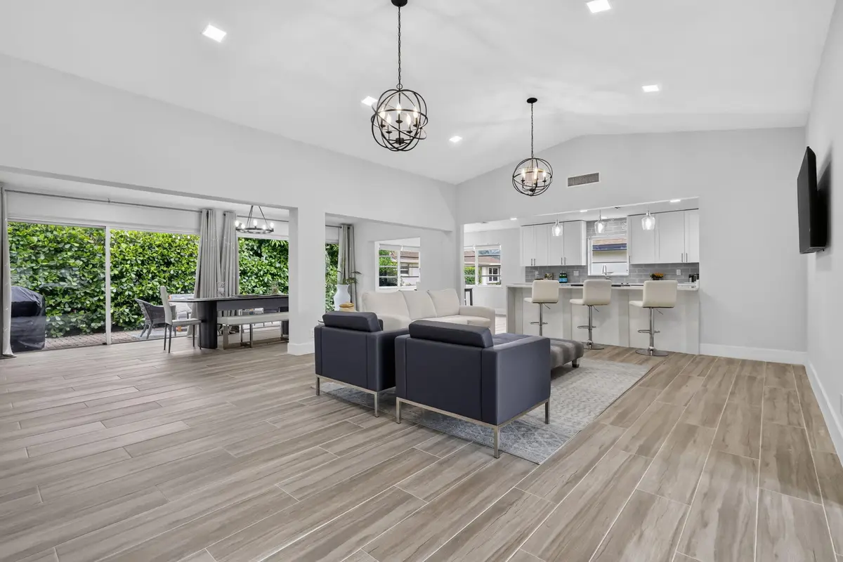 LIVING ROOM WITH CATHEDRAL CEILINGS at 10723 GREENTRAIL Drive, Boynton Beach