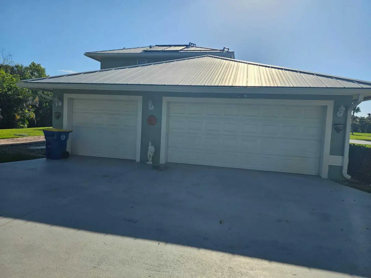 Exterior Garage at 8289 SE PILOTS COVE Terrace, Hobe Sound