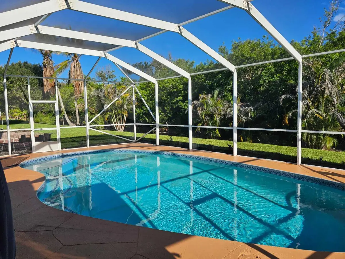 Pool - Screen Lanai - Rear Yard at 8289 SE PILOTS COVE Terrace, Hobe Sound