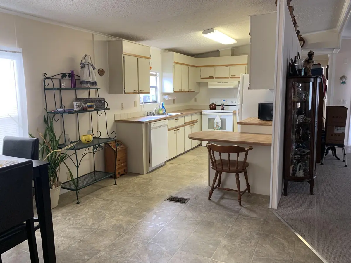Dining to Kitchen at 8 SE Hernando Lane, Port St. Lucie