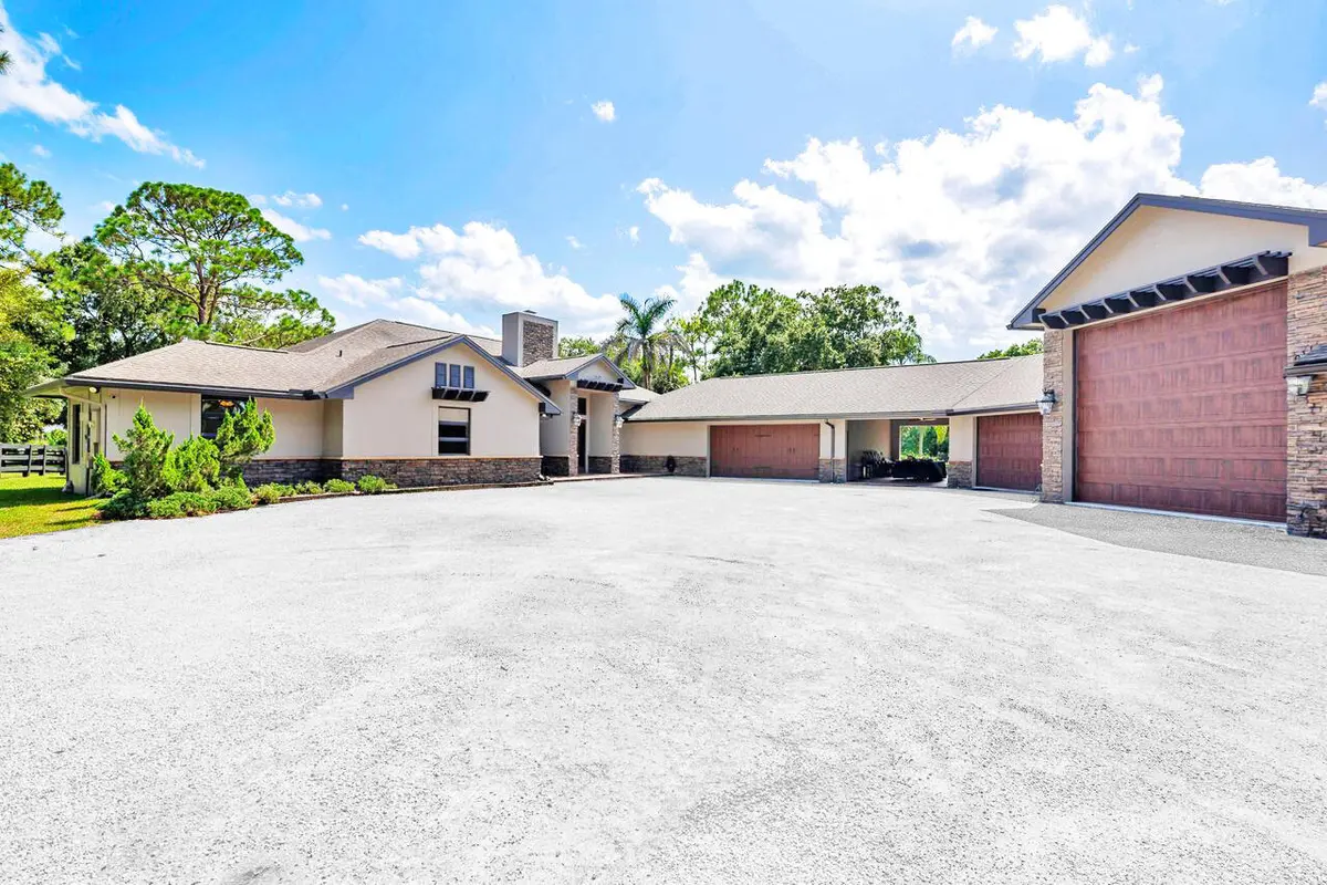 Entrance, Multi Sturtures at 14590 CRAZY HORSE Lane, Palm Beach Gardens