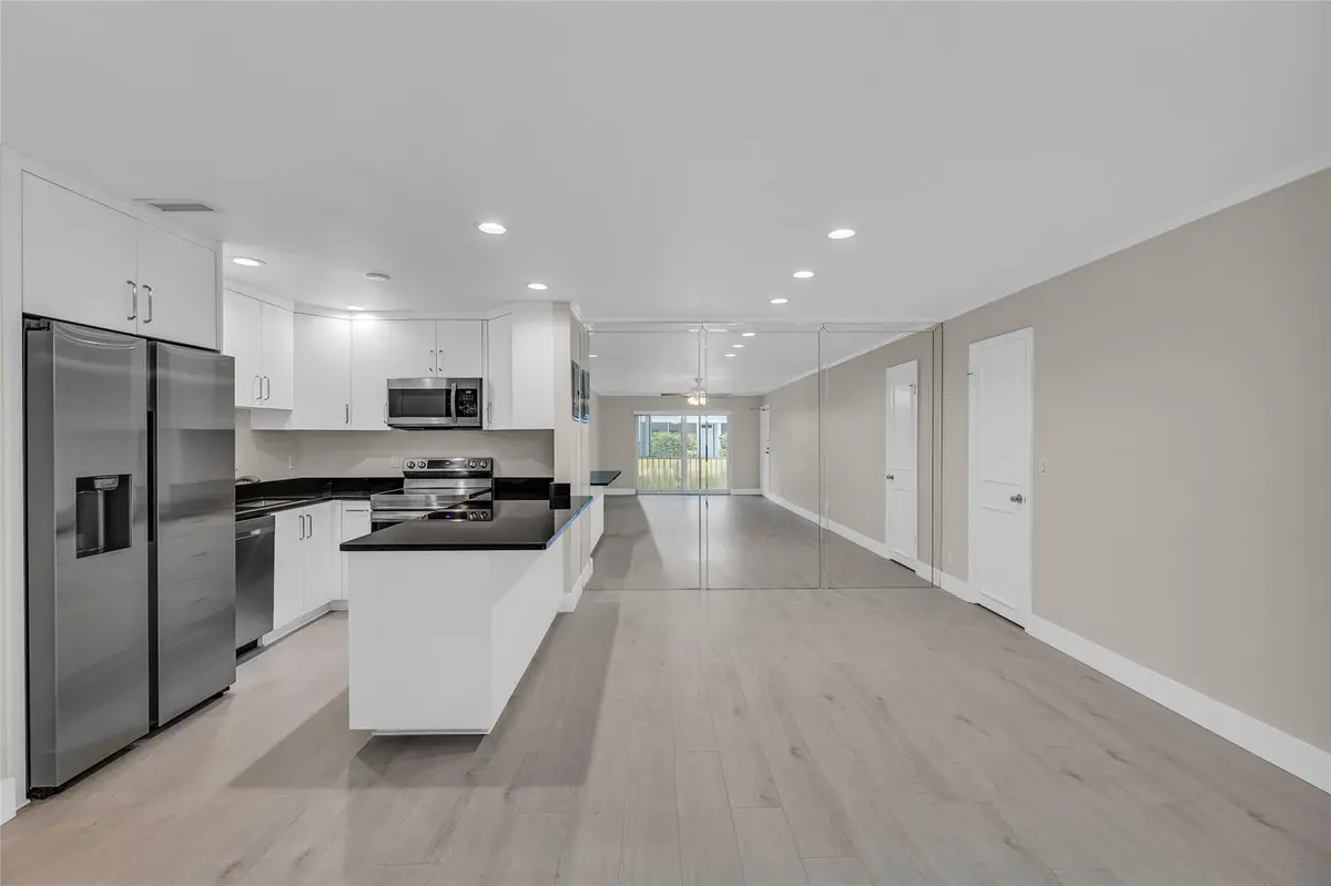 Dining area with large pantry closet at 6319 Bay Club Drive 1, Fort Lauderdale