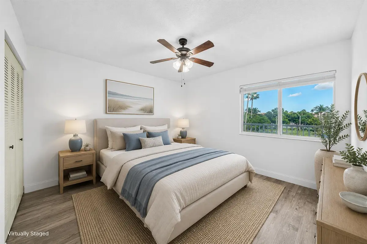 Bedroom 1 - Virtually staged at 9580 Weldon Circle 408k, Tamarac