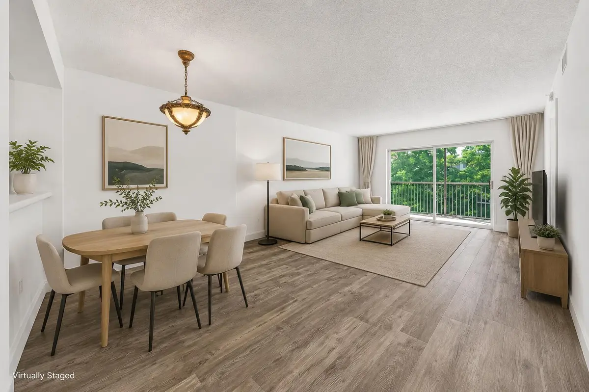 Living room virtually staged at 9580 Weldon Circle 408k, Tamarac