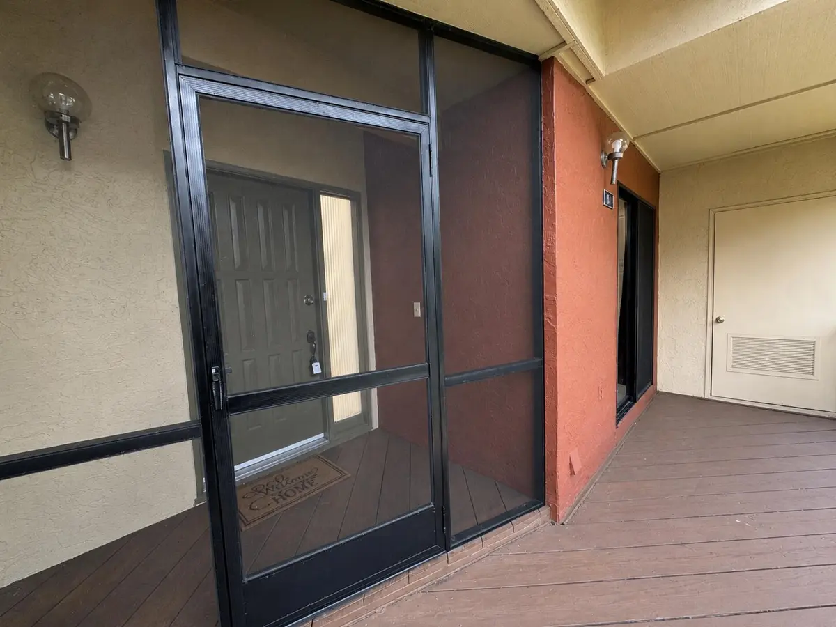 Screened in front entry at 12969 Pennypacker Trail 16, Wellington