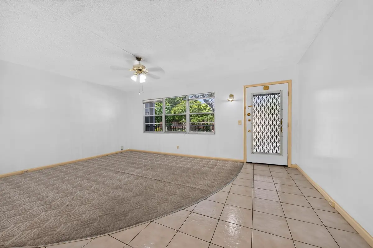 View of Front Door/Window at 101 SW 132nd Way 215J, Pembroke Pines