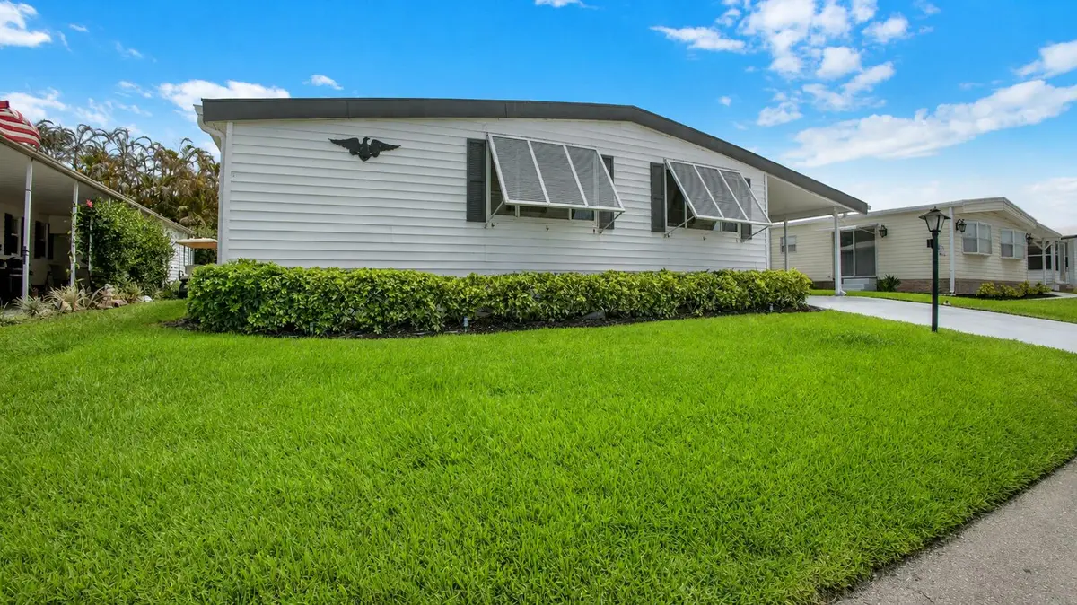 FRONT at 140 NE Pinelake Village Boulevard, Jensen Beach