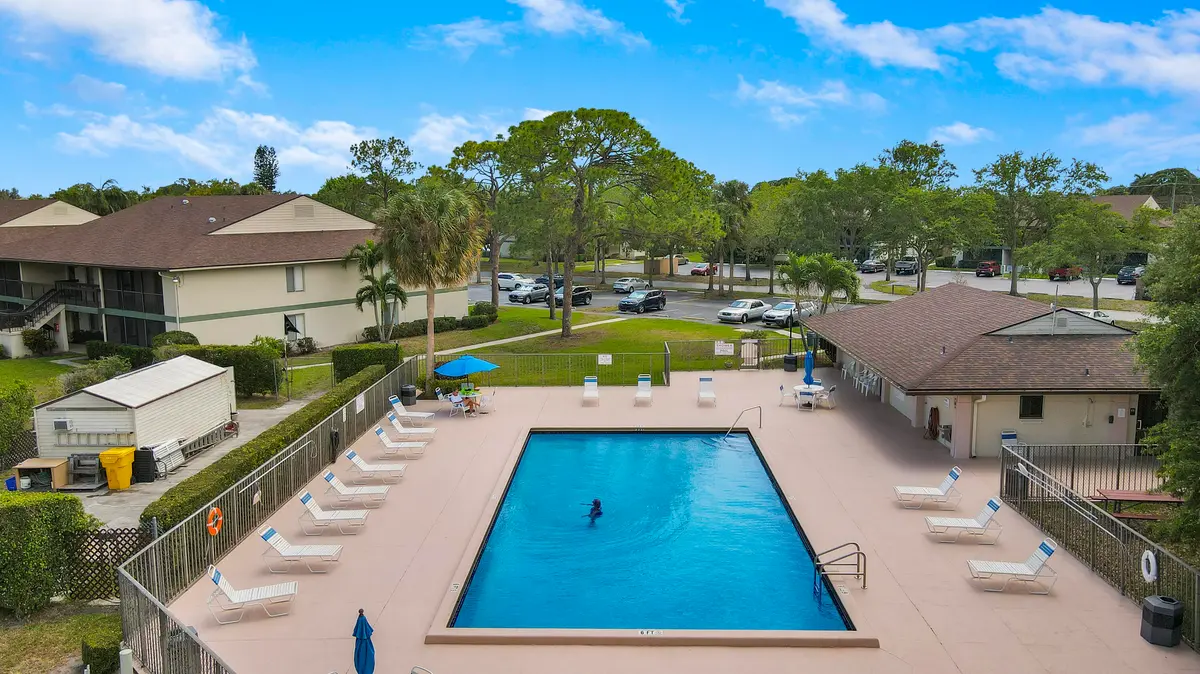 Community pool at 6520 Chasewood Drive H, Jupiter