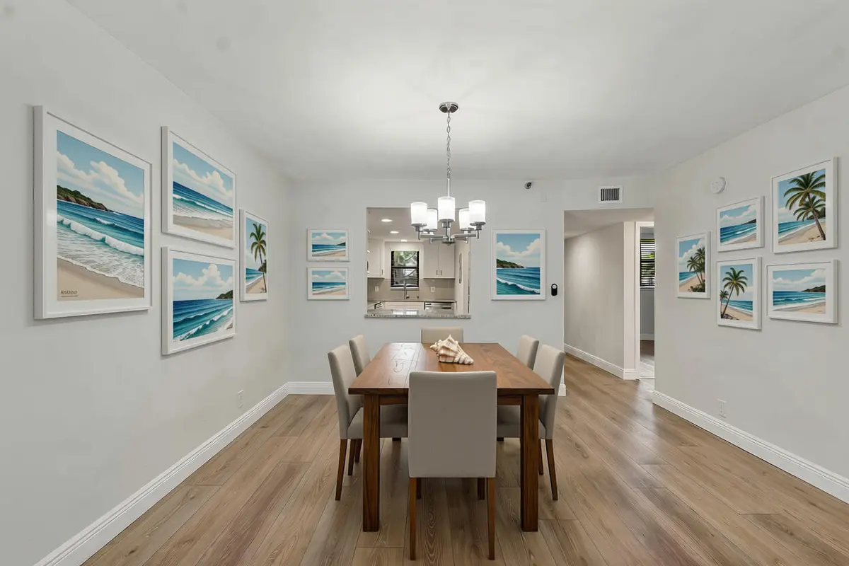 AI Staged Dining Area at 2400 Deer Creek Country Club  Boulevard 102-1, Deerfield Beach