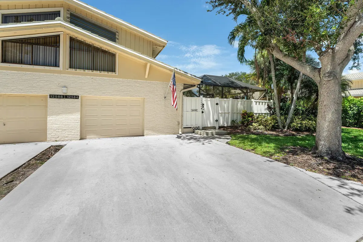 Front of Townhome at 12584 WOODMILL Drive, Palm Beach Gardens