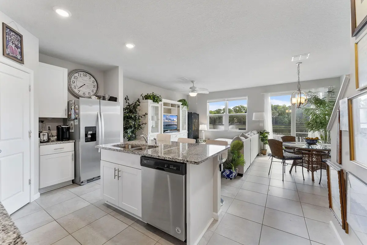 Open Living, Dining and Kitchen at 3947 SE Mentmore Lane, Stuart