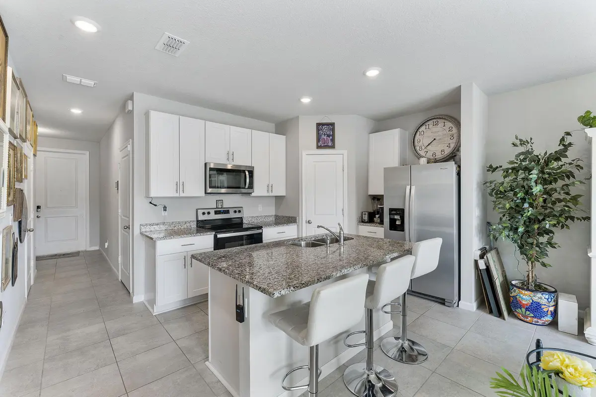 Kitchen with Counter Tops at 3947 SE Mentmore Lane, Stuart