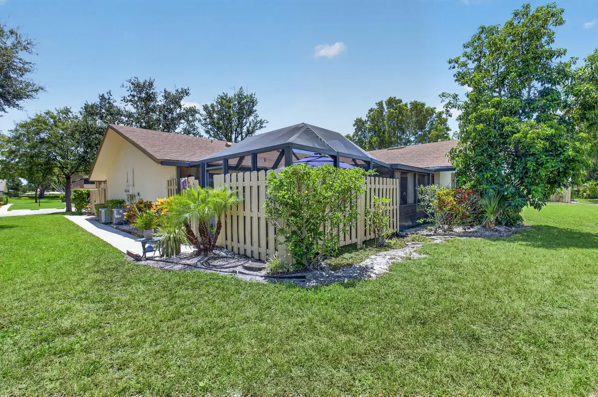 SCREENED AND OPEN PATIO AREA at 872 NW 29TH Avenue B, Delray Beach