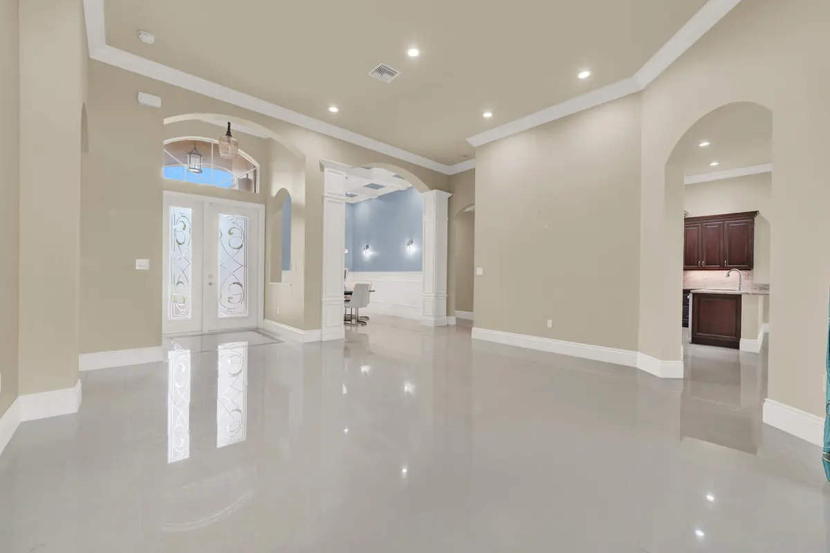 Grand Entry with Soaring Ceilings at 10469 Whitewind Circle, Boynton Beach
