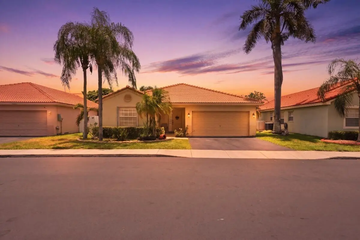 001_DSC05928_twilight_5a833e8f_MLS at 12564 NW 10TH Place, Sunrise