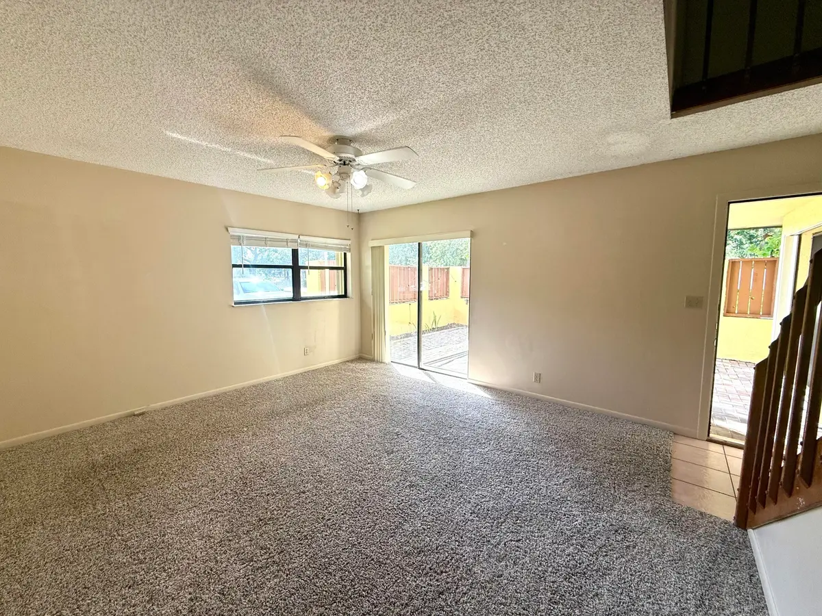 Living Room w/ Patio Access at 3100 SE Brook Street, Stuart