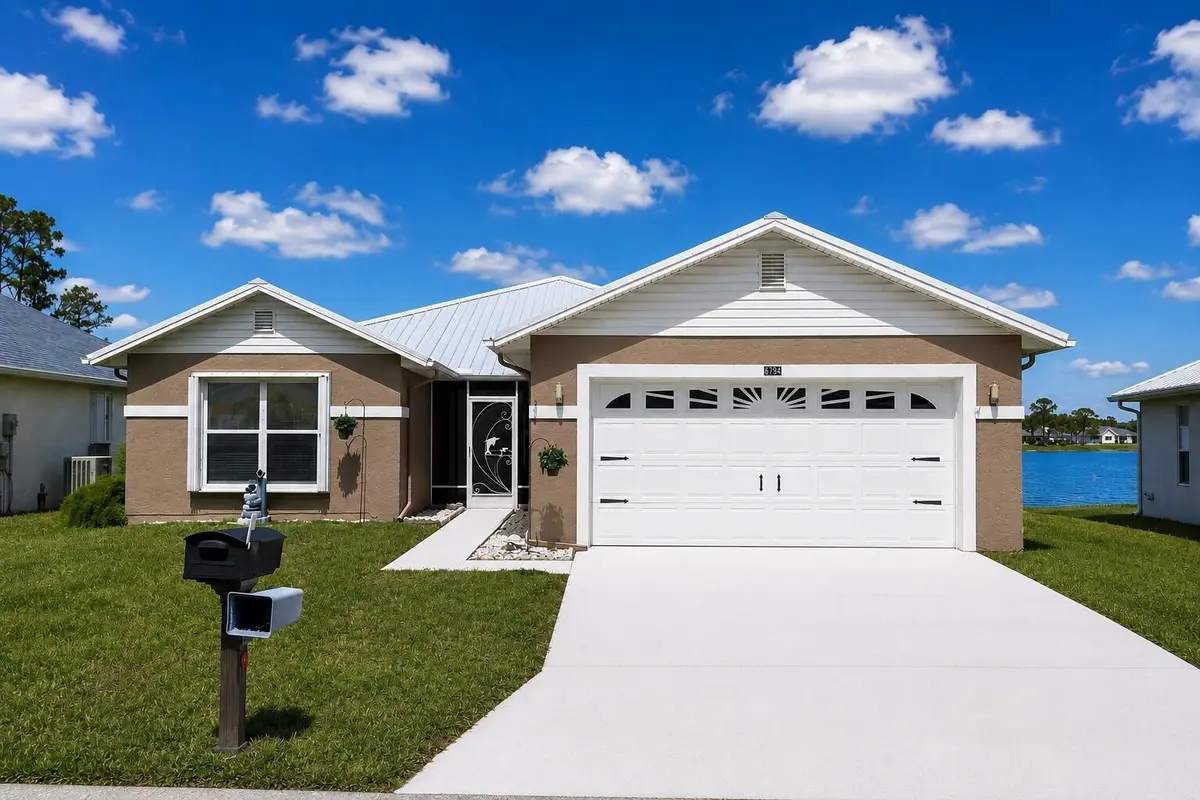 House_Front_Lakeview_Enhanced at 6794 Picante Circle, Fort Pierce