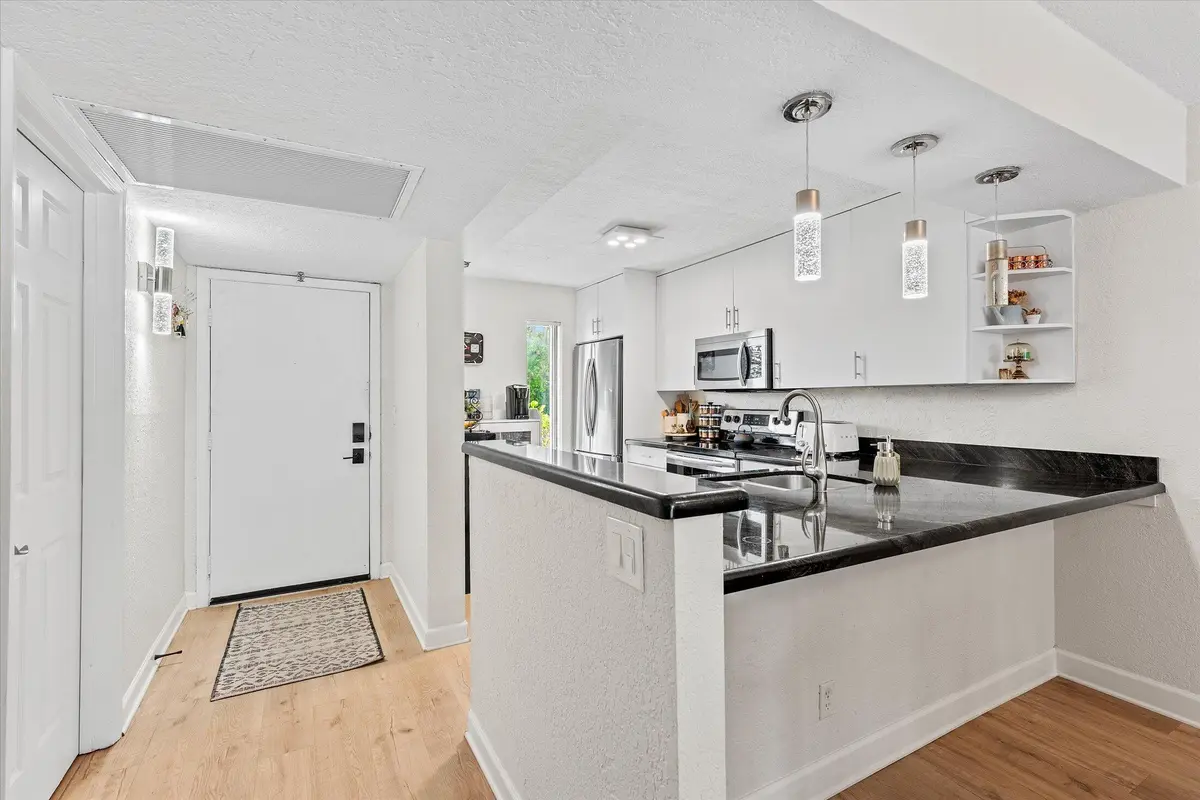 Foyer/Kitchen at 21 ROYAL PALM Way 1050, Boca Raton