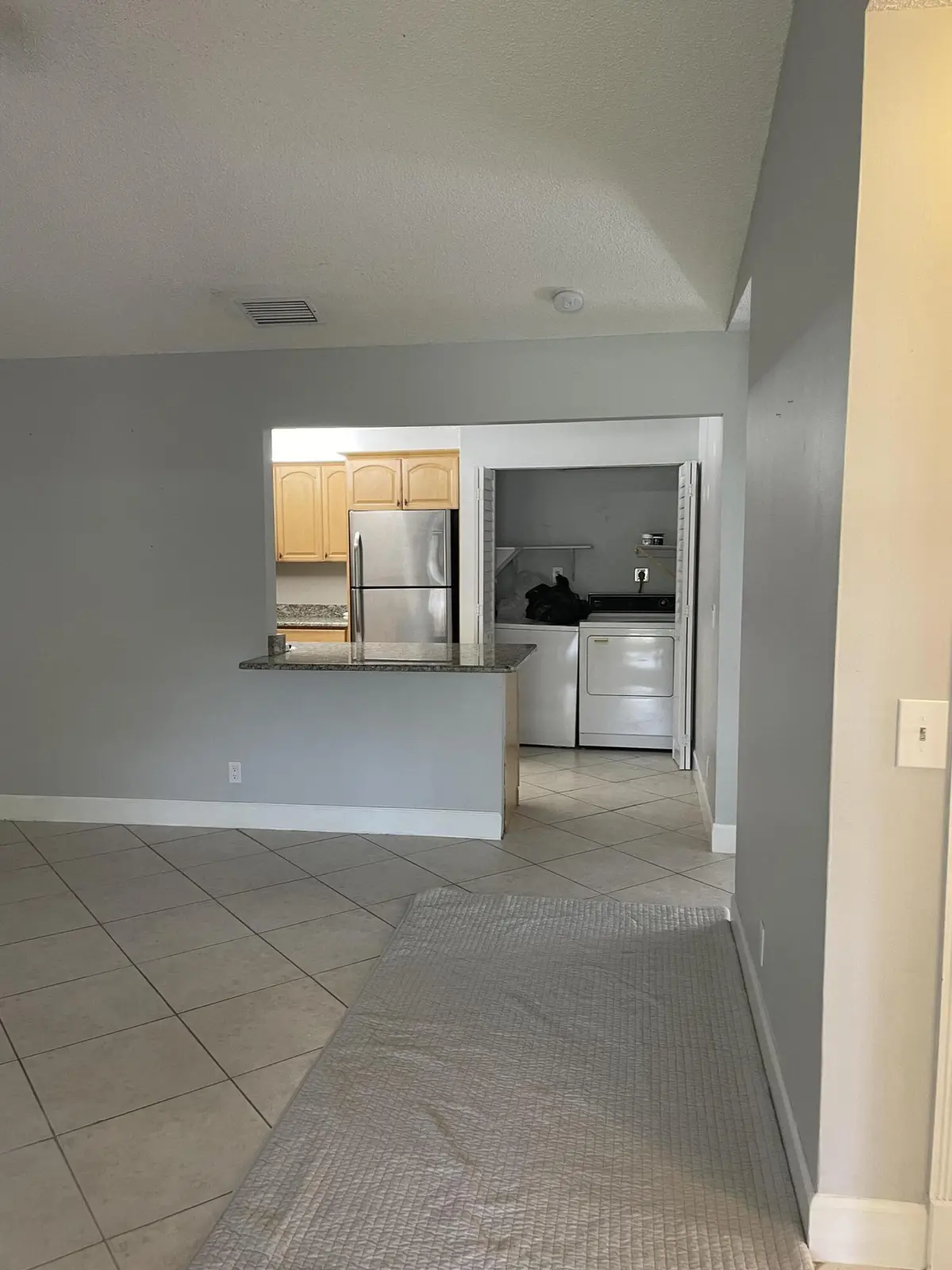 Living Room and Kitchen at 9037 SE HOBE RIDGE Avenue, Hobe Sound