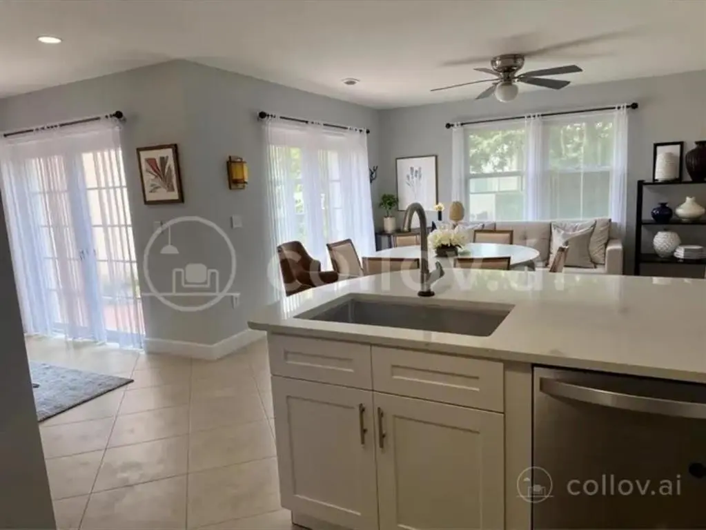 Kitchen/View to family room at 4151 EASTRIDGE Circle, Deerfield Beach