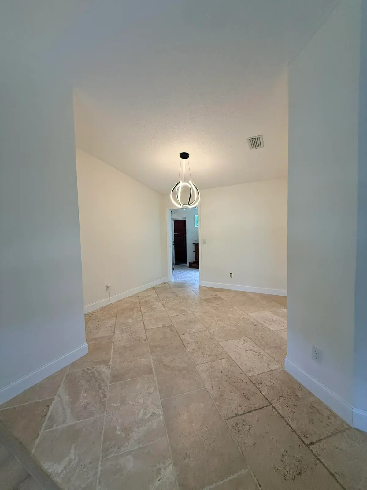 Entry/Dining at 550 SW Natura Avenue, Deerfield Beach