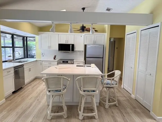 5306 - Kitchen with plenty of storage an at 5306 SE ORANGE Street, Stuart