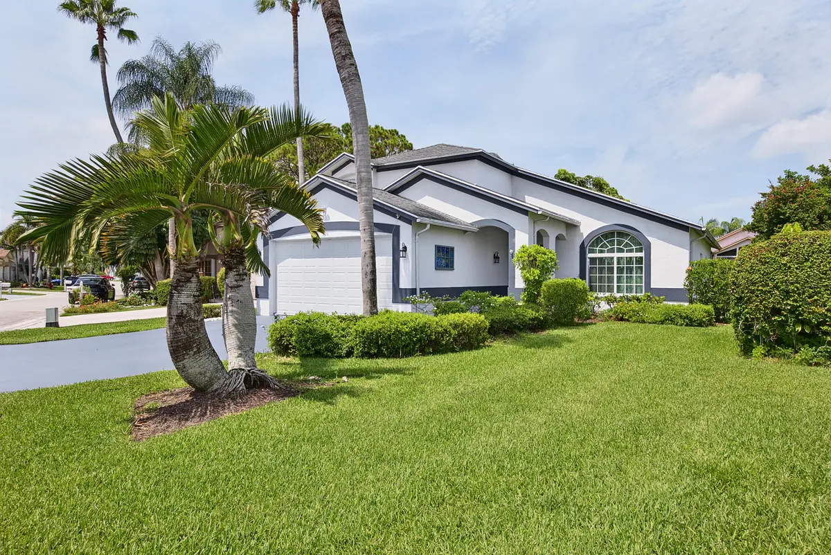 128 Hammock Dr (14) at 126 HAMMOCKS Drive, Greenacres