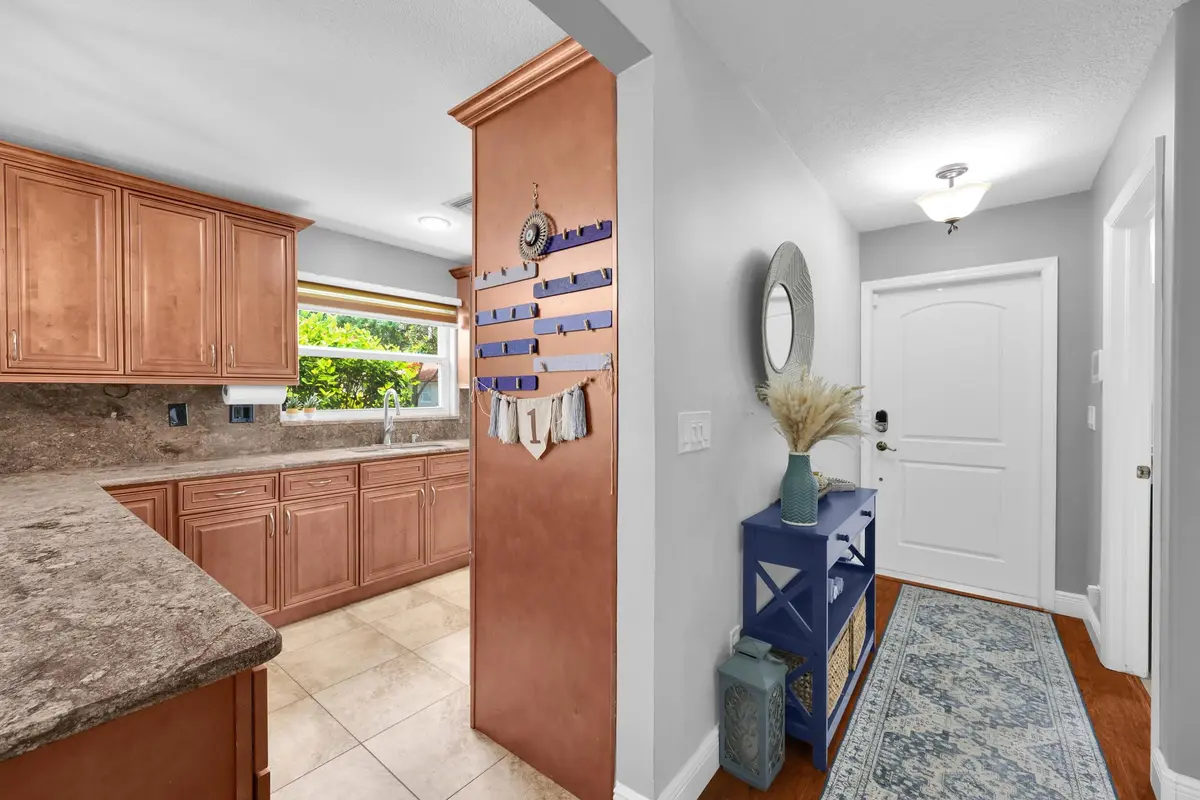 Entryway/Kitchen at 2195 SW Shoal Creek Trace, Palm City