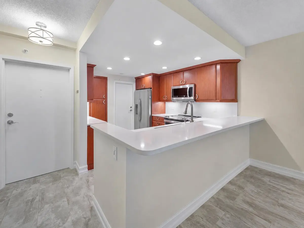 Kitchen and main entrance at 1500 S Ocean Boulevard 207, Lauderdale-By-The-Sea